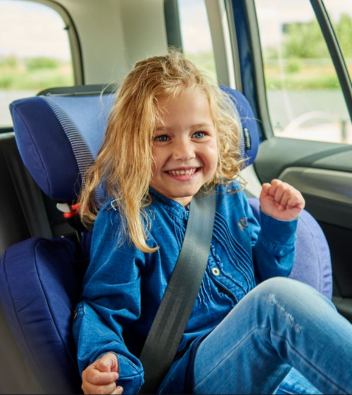 Smiling child sitting in Maxi-Cosi Car Seat